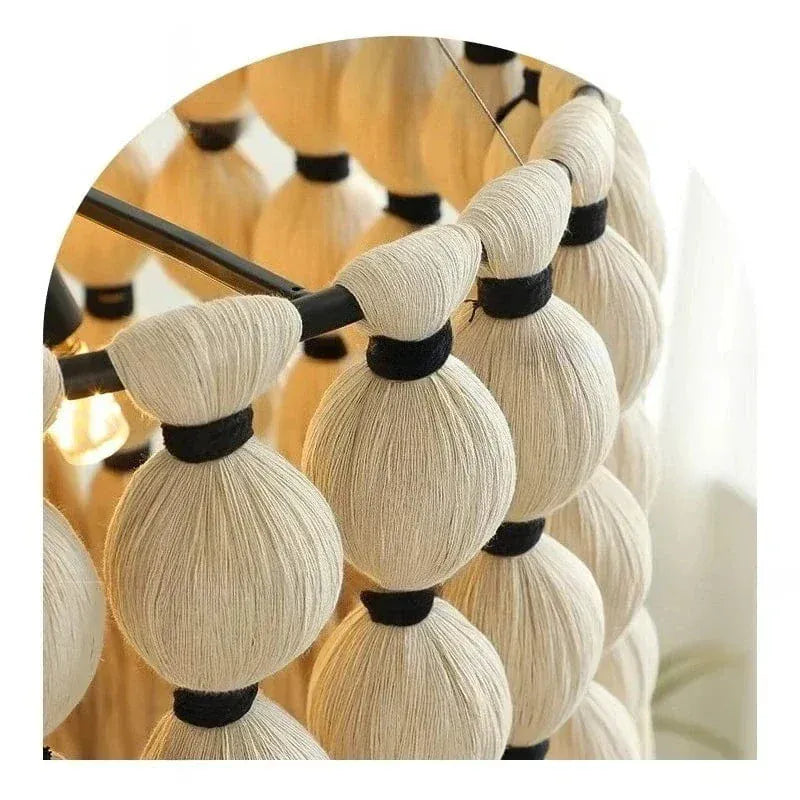 ECLAIRAGE SUSPENSION Suspension bohème avec pampille en laine