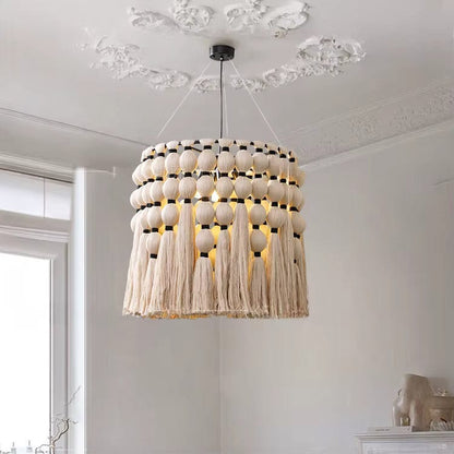 ECLAIRAGE SUSPENSION Suspension bohème avec pampille en laine