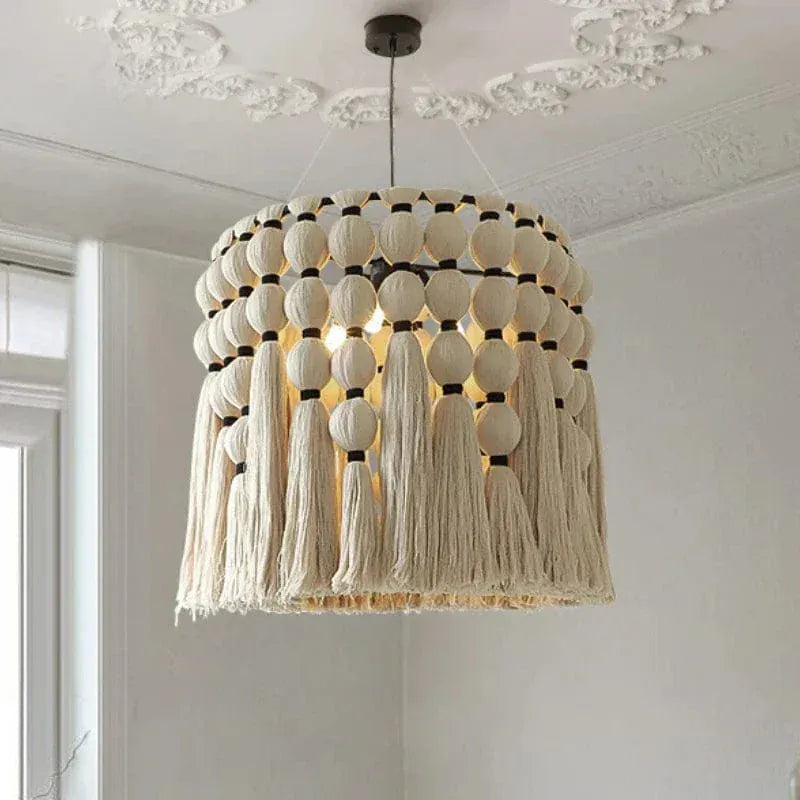 ECLAIRAGE SUSPENSION Suspension bohème avec pampille en laine