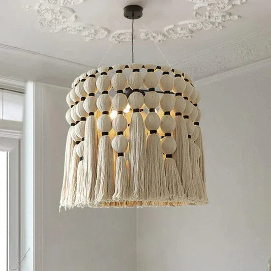 ECLAIRAGE SUSPENSION Suspension bohème avec pampille en laine