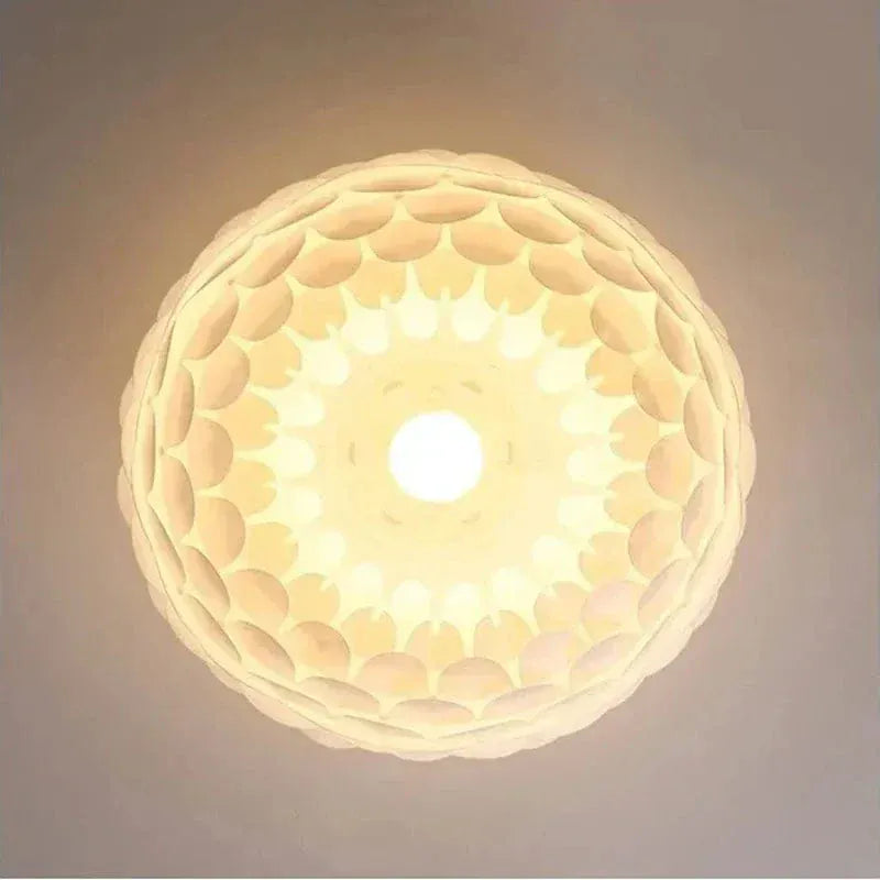 ECLAIRAGE SUSPENSION Suspension en forme de fleur de lotus